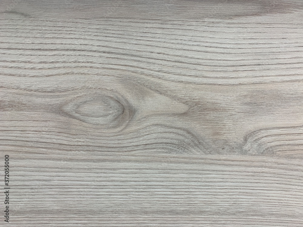Fototapeta premium Background texture: the structure of a wooden surface. Decorative board, close-up. Material for making furniture.