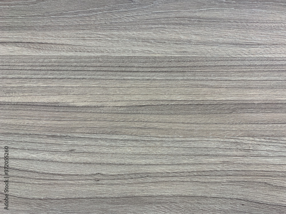 Fototapeta premium Background texture: the structure of a wooden surface. Decorative board, close-up. Material for making furniture.