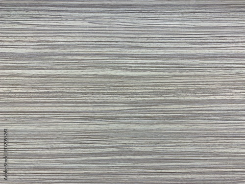 Background texture: the structure of a wooden surface. Decorative board, close-up. Material for making furniture.