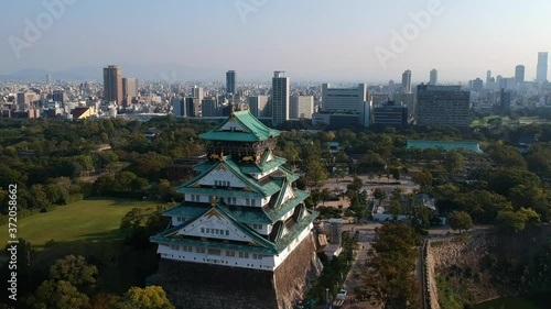 Aerial Footage of Osaka Castle and Osaka city in the Autumn photo