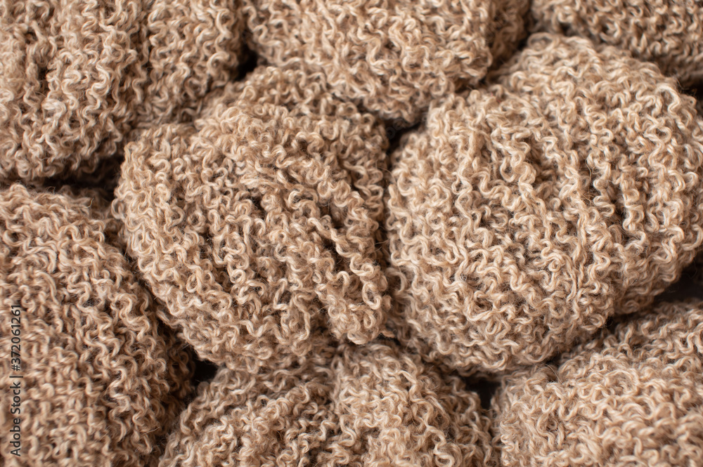 Woolen yarn for knitting. Wool thread for knitting. Own hand. Knitting and needlework. Yarn for a scarf, sweater and socks Woolen yarn for knitting. Wool thread for knitting. Own hand. Knitting and needlework. Yarn for a scarf, sweater and socks