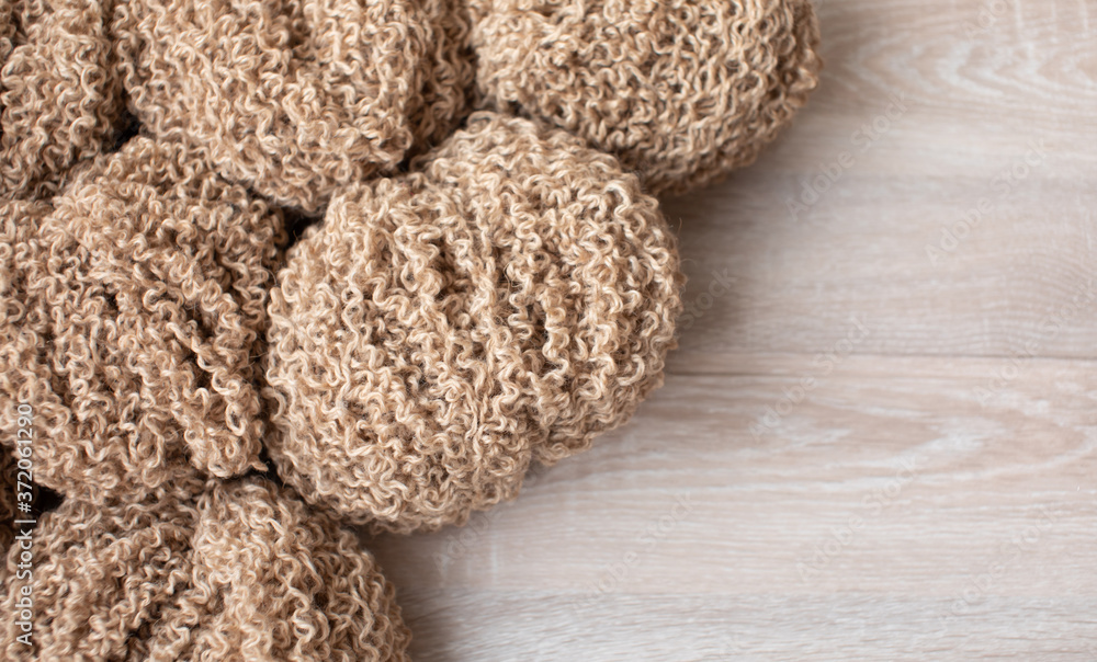 Woolen yarn for knitting. Wool thread for knitting. Own hand. Knitting and needlework. Yarn for a scarf, sweater and socks Woolen yarn for knitting. Wool thread for knitting. Own hand. Knitting and needlework. Yarn for a scarf, sweater and socks