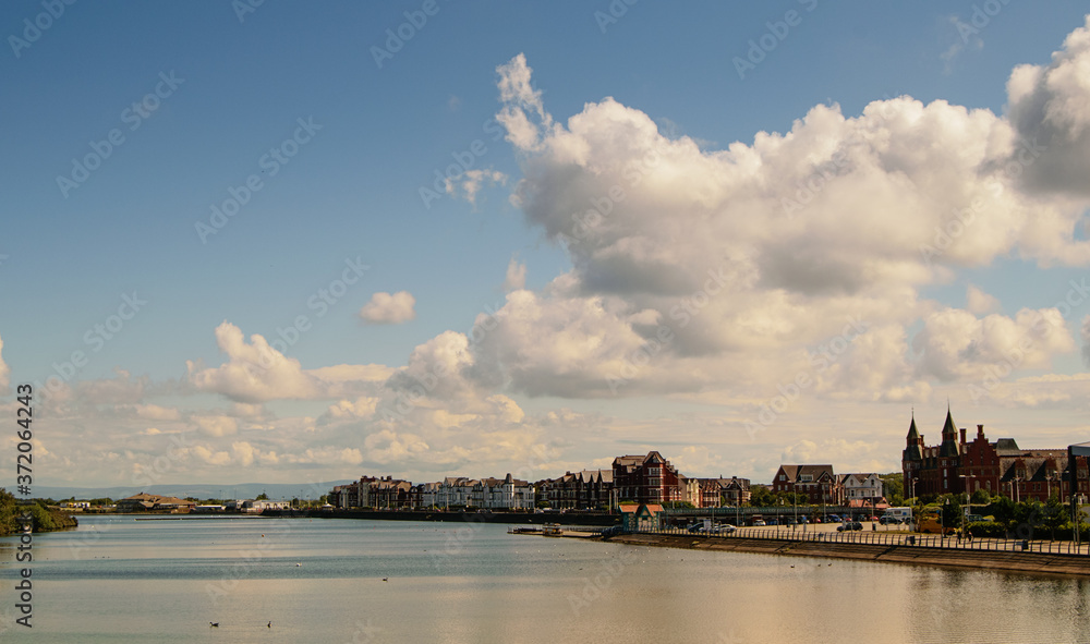 River and city skyline. Panoramic view in summer.