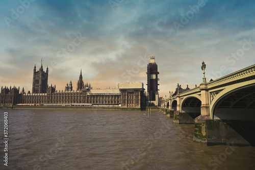 The Palace of Westminster along the banks of the Thames in central London, UK.