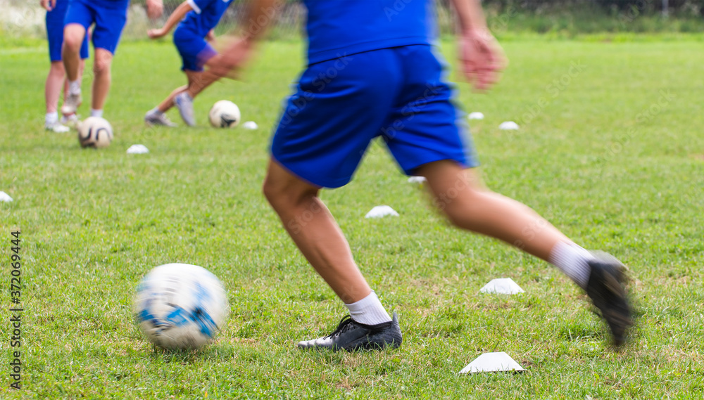 Boy Soccer Player In Training.