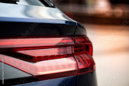 rear light of a luxury car. bright sunlight