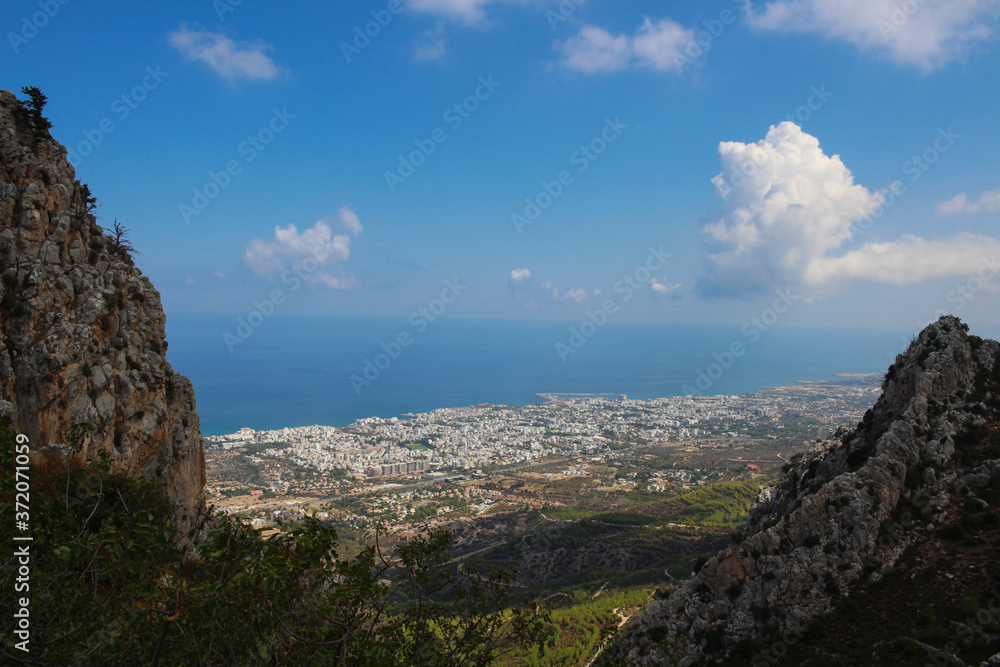  View from above, from the castle of Saint Hilarion, on the city of Kyrenia and the Mediterranean sea. Cyprus...