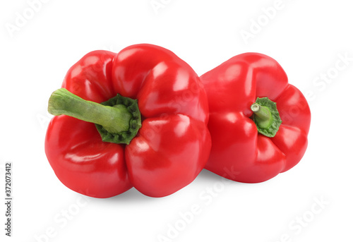 Ripe red bell peppers isolated on white