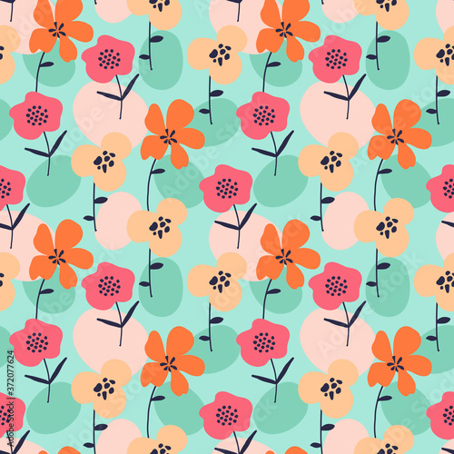 multicolored small flowers on mint color seamless background