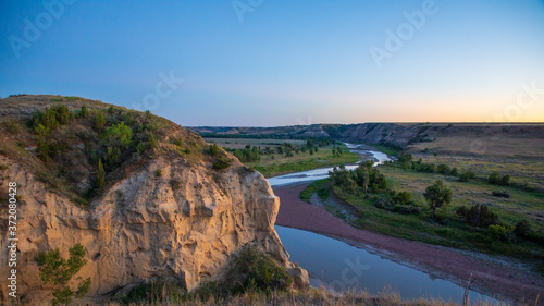 View of cliff and river at sunset