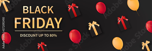 Black Friday card or poster template. Colorful gift boxes and balloons on black background.