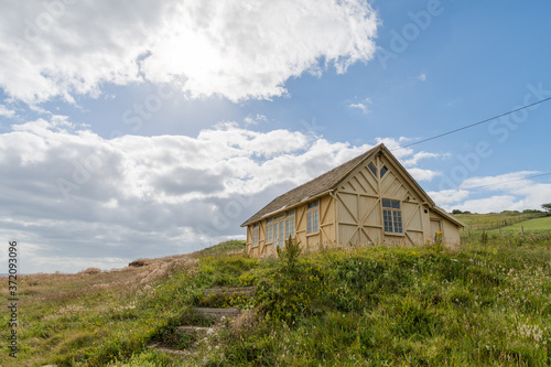 View of the wooden hut at the foot of Thorncombe Beacon on the southwest coastpath in Dorset photo