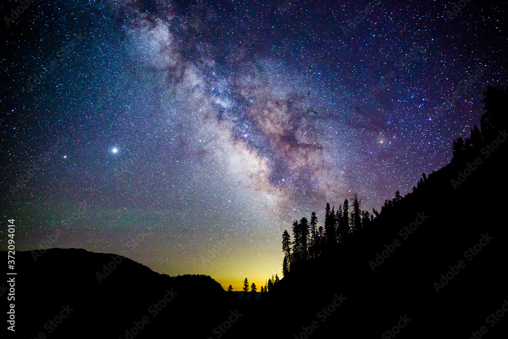 The Milky Way rising over the landscape of Lassen Volcanic National Park in California. The Milky Way rising over the landscape of Lassen Volcanic National Park in California.