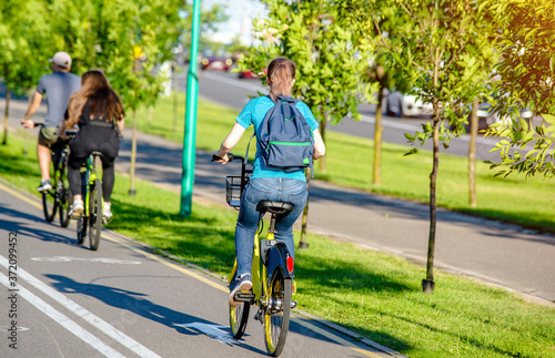 Wallpaper Mural Cyclist ride on the bike path in the city Park  Torontodigital.ca