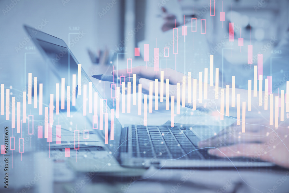 Multi exposure of woman hands typing on computer and financial graph hologram drawing. Stock market analysis concept. Multi exposure of woman hands typing on computer and financial graph hologram drawing. Stock market analysis concept.