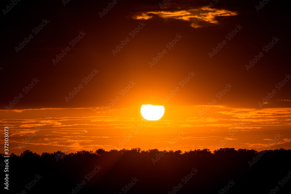 Obraz premium dark sunset with cloudy sky