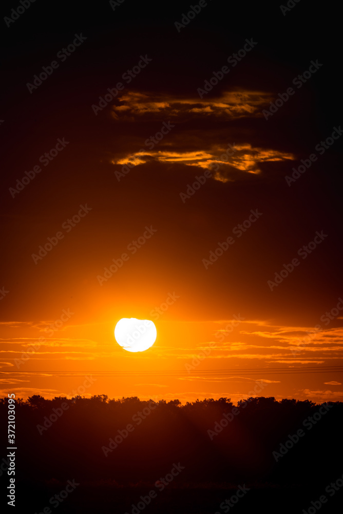 dark sunset with cloudy sky