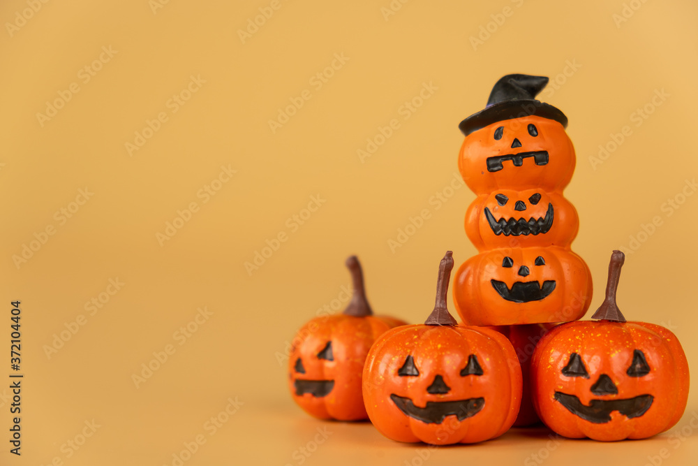 Happy Halloween, Pumpkins on orange background, halloween concept. Copy space. Happy Halloween, Pumpkins on orange background, halloween concept. Copy space.