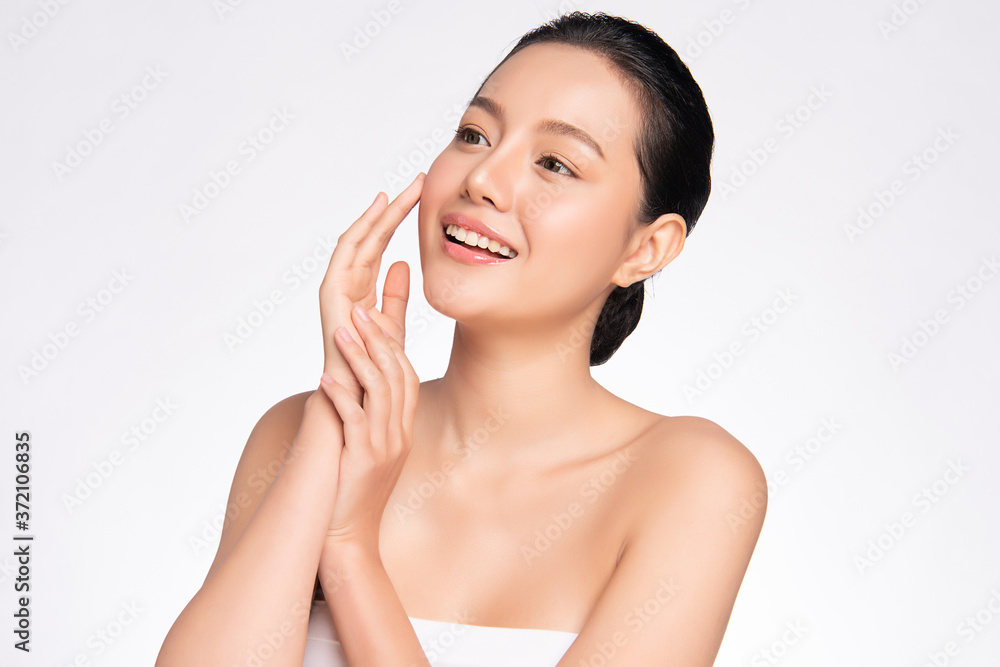 Beautiful Young asian Woman with Clean Fresh Skin, on white background, Face care, Facial treatment, Cosmetology, beauty and spa, Asian women portrait Beautiful Young asian Woman with Clean Fresh Skin, on white background, Face care, Facial treatment, Cosmetology, beauty and spa, Asian women portrait