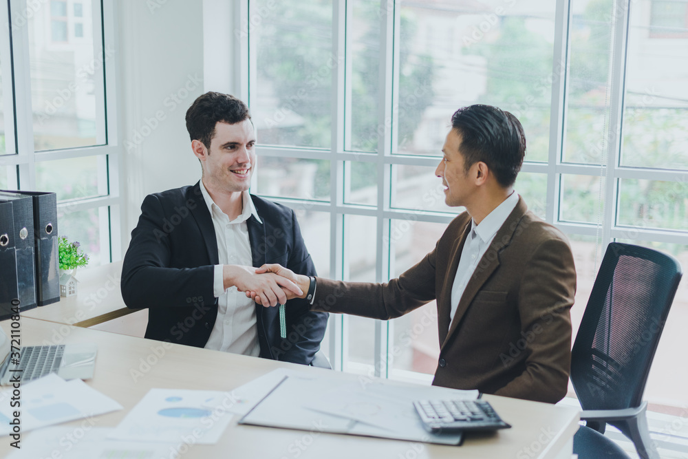 Business people can make business deals. The congratulatory handshake. Business people can make business deals. The congratulatory handshake.