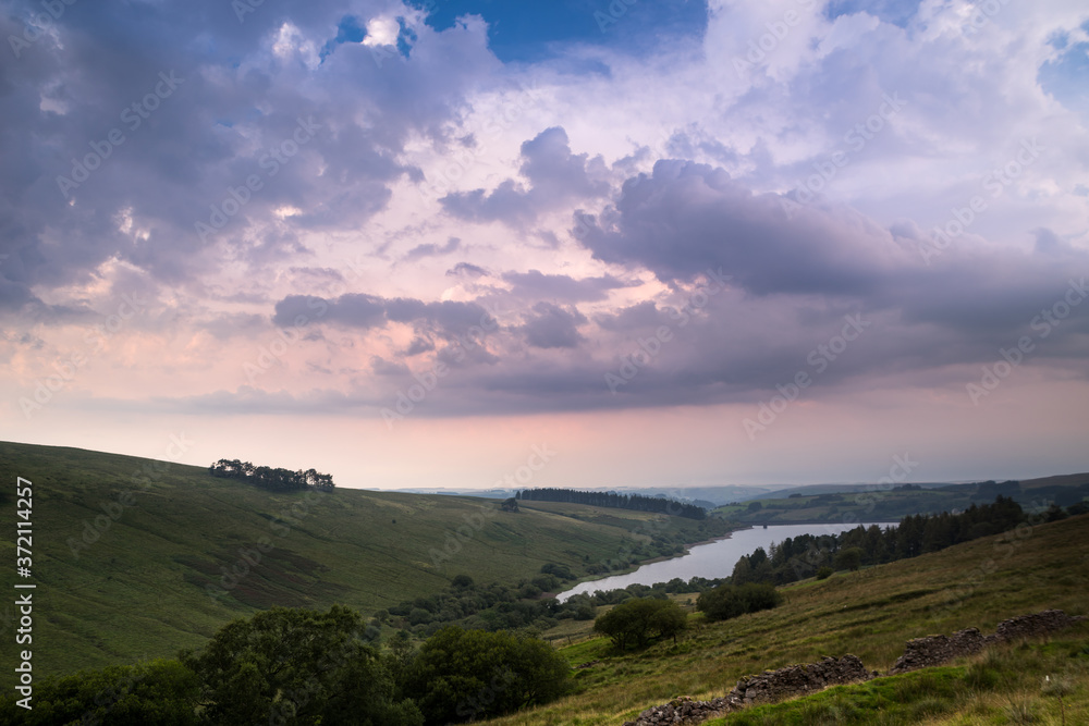 The colors of the sky before the storm. View of Cray Reservoir in Brecon Beacons National Park in Wales.