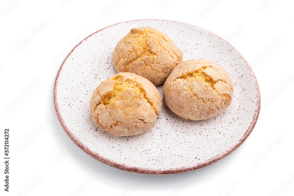 Almond cookies isolated on white background. Side view.