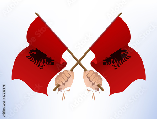 Flying flags crossed from the country of Albania