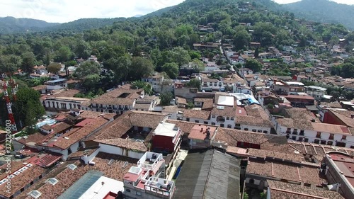 Vista aérea sobre las tradicionales casas a dos aguas con teja de Valle de Bravo en el Estado de México photo