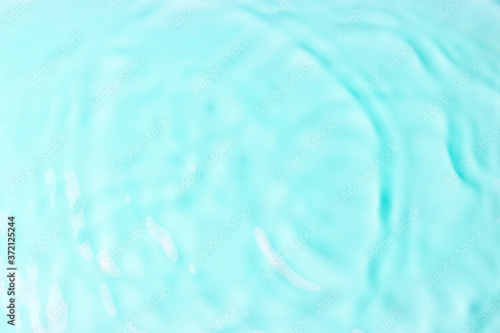Transparent blue water with fine ripples and shadows, natural creative background. Transparent blue water with fine ripples and shadows, natural creative background.