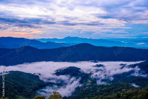 Beautiful landscape with Misty morning sunrise at Doi Mon Ngao View point  Chiang mai in northern Thailand