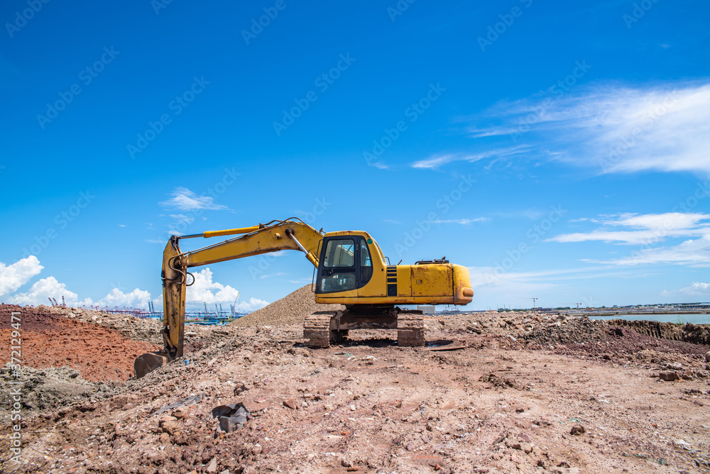 Excavator on the construction site Excavator on the construction site