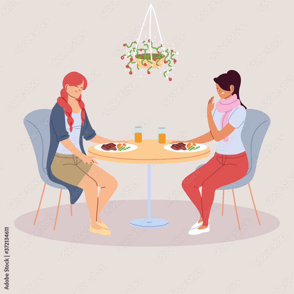 women having dinner in the restaurant