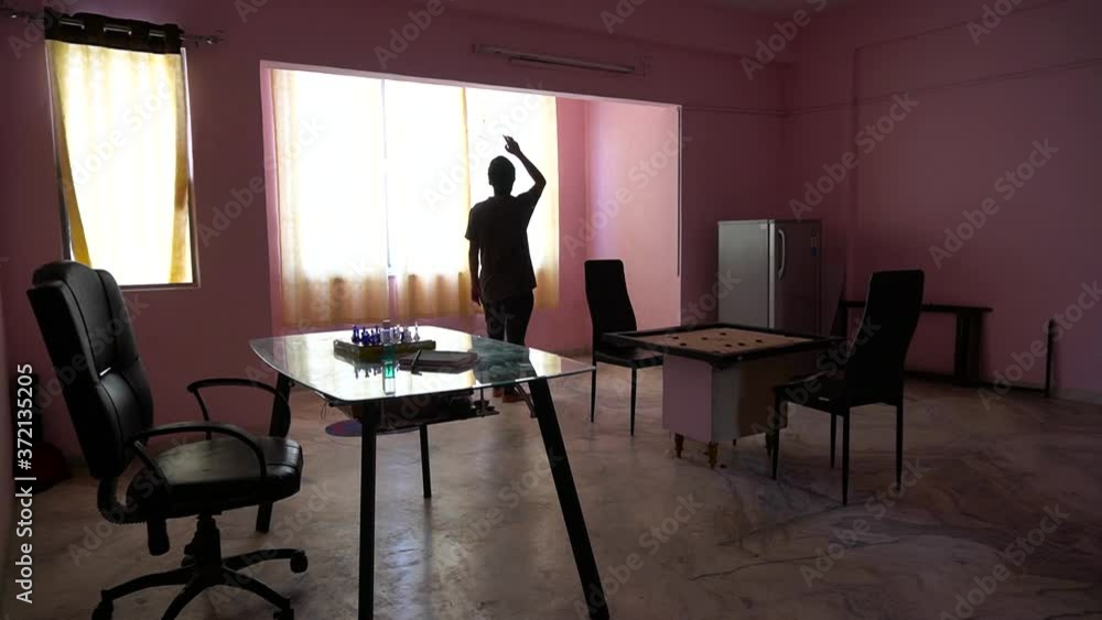 Young man alone in the house due to pendemic and lockdown Young man alone in the house due to pendemic and lockdown