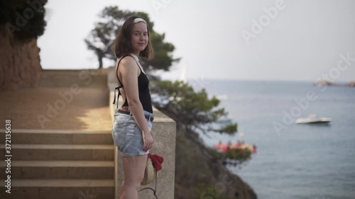 Young female model in the heavenly part of the island Costa Brava in Catalonia. photo