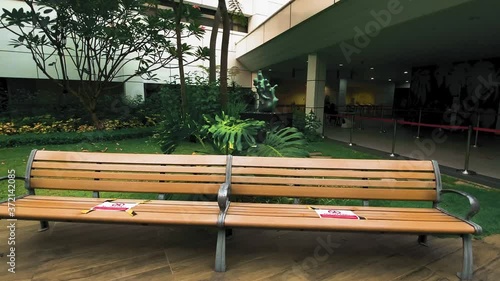 Wallpaper Mural Empty Wooden Benches With Social Distancing Stickers Outside The National University Hospital During Phase Two Post-Circuit Breaker Measures Due To Coronavirus Outbreak In Singapore.  - zoom in shot Torontodigital.ca