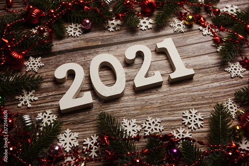 2021 Happy New Year and Christmas decoration on wooden background © may1985