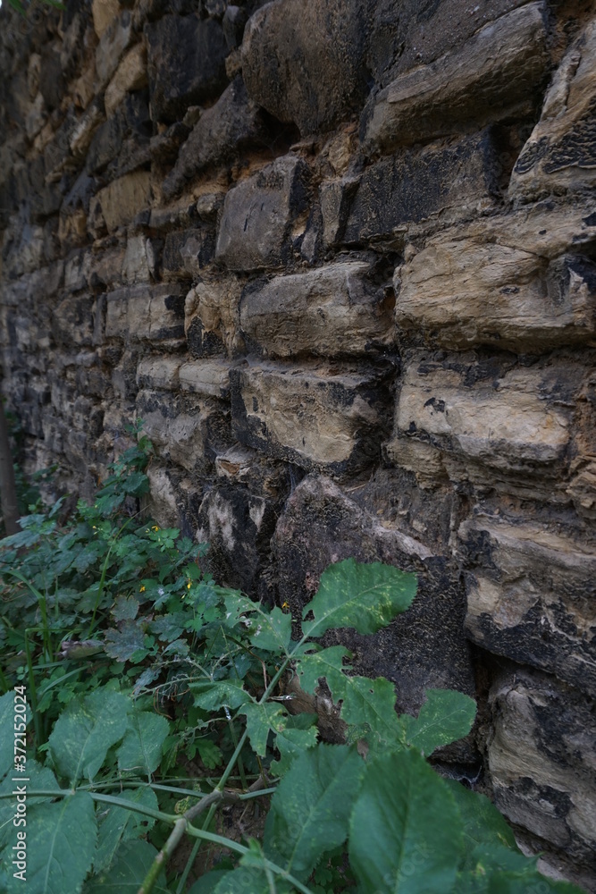 old stone wall in the city