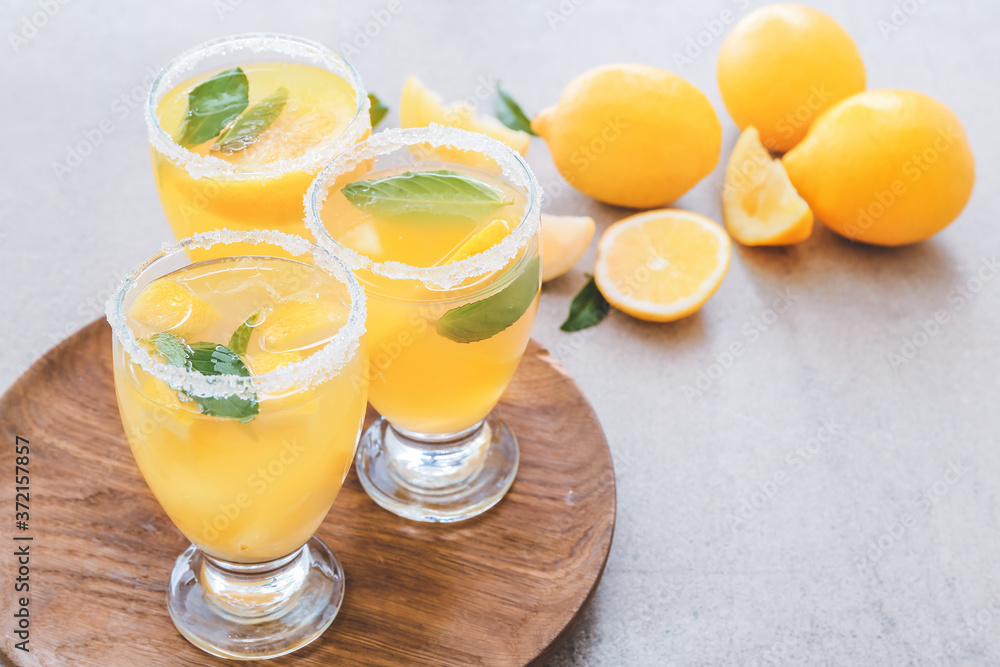 Glasses of fresh lemonade on table Glasses of fresh lemonade on table