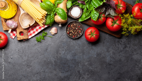 Italian cuisine ingredients. Tomatoes, pasta, herbs and spices