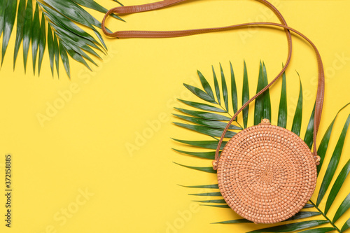 Wicker bag on color background
