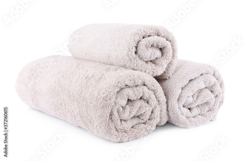 Rolled soft terry towels isolated on white