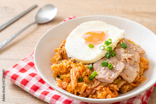 Kimchi fried rice with fried egg and pork