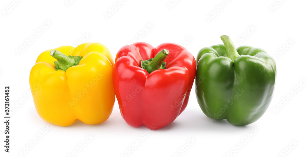 Fresh ripe colorful bell peppers isolated on white Fresh ripe colorful bell peppers isolated on white