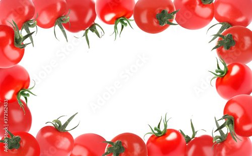 Frame of ripe tomatoes on white background