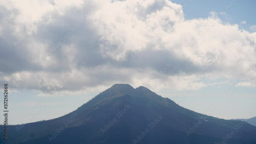 Bali, Indonesia, time lapse view of sunrise above volcano Batur. Bali, Indonesia, time lapse view of sunrise above volcano Batur.