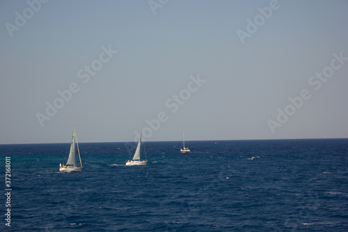 Greece. Rhodes island. Rest at the sea. Euro-trip. Sea water surface. Boats. © andreswestrum