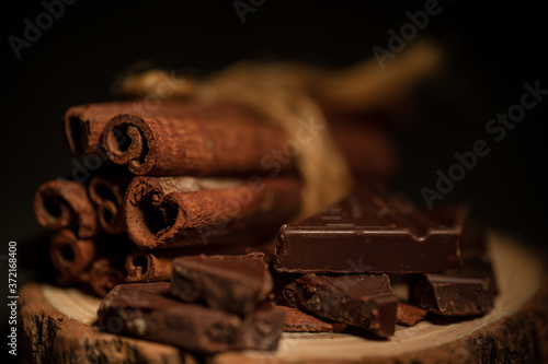 composition of coffee beans, shecolade, cinnamon and cocoa