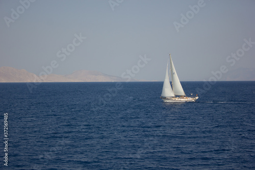 Greece. Rhodes island. Rest at the sea. Euro-trip. Sea water surface. Boats. © andreswestrum