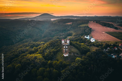 Calvary is 398 m above sea level a high hill and a place of pilgrimage in the district of Litomerice in the Usti nad Labem region. It lies about 0.7 km to the south-east from the village of Ostre. photo