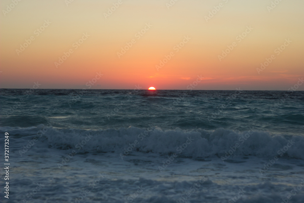 Greek beaches at sunset. Rhodes island. Summer vacation. Euro-trip.